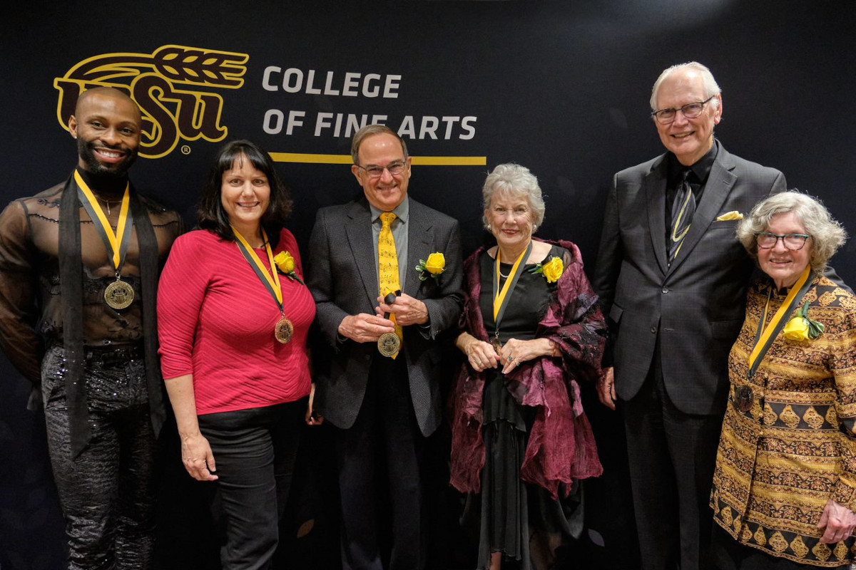 Hall of fame inductees pose with Rodney Miller, dean of the College of Fine Arts.
